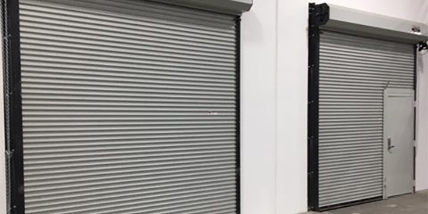 Two roll up doors set up by our Ventura industrial garage door company.